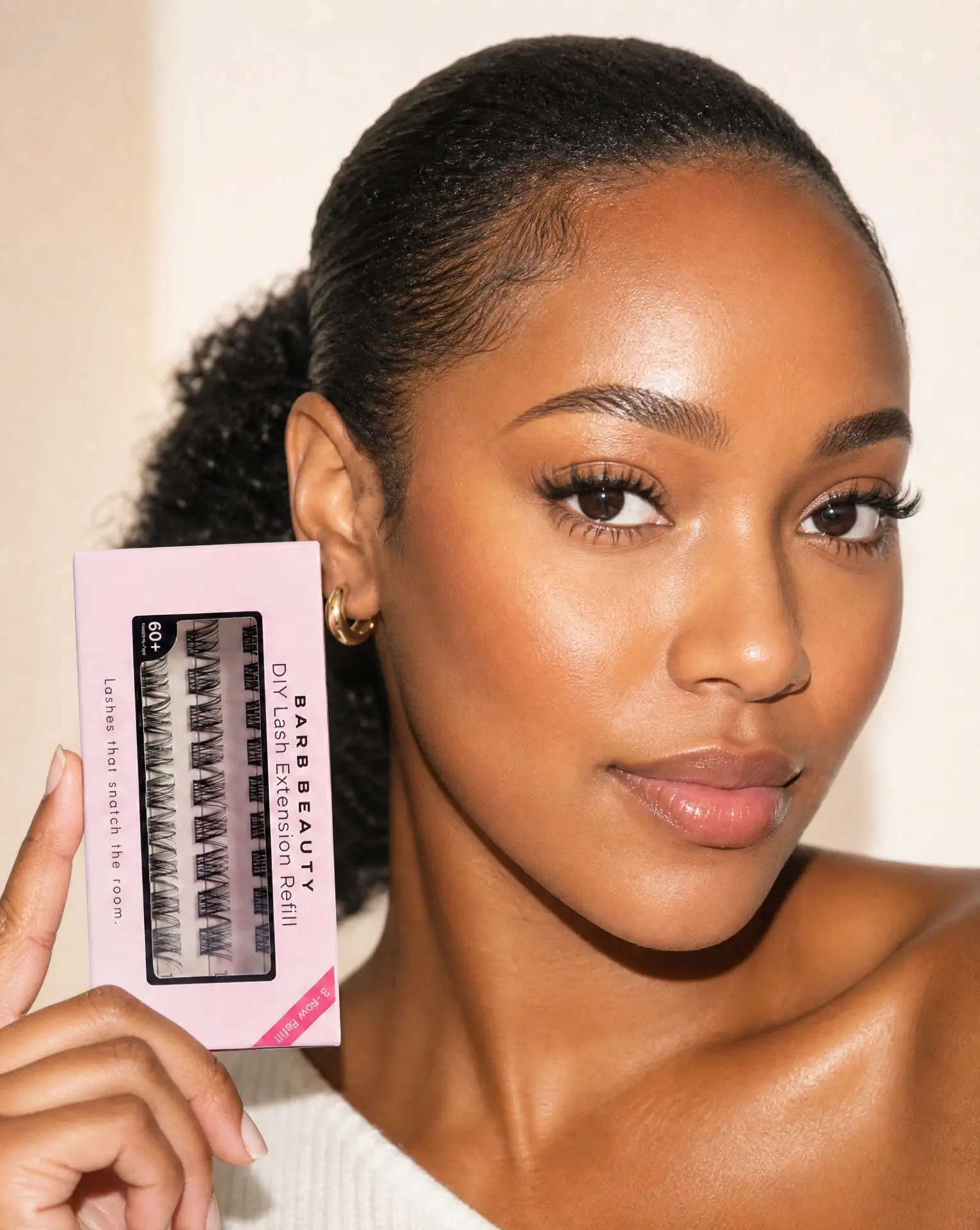 Model wearing Lash Barb Beauty lashes